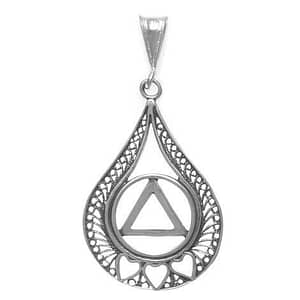 A silver pendant with the symbol for alcoholics anonymous.