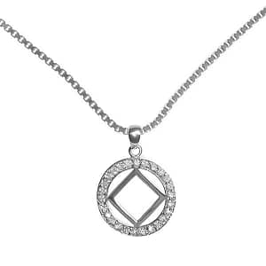 A silver necklace with a diamond shaped symbol.