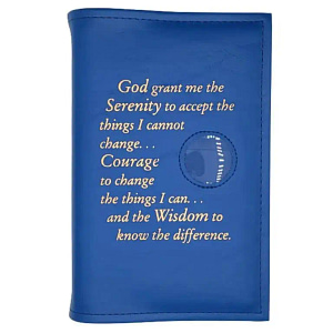 A blue book with the words god grant me the serenity to accept the things i cannot change. Courage to change the things i can, and