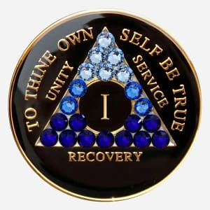 The deep blues and blacks of this Crystal AA Medallion are created with Swarovski crystals and evoke feelings of calmness and strength, symbolizing the journey toward serenity in recovery.