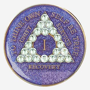 A pink crystal AA medallion with glitter and diamond accents, featuring the AA symbol and sobriety year options.