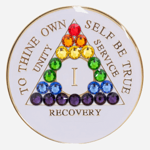 This Crystal AA Medallion celebrates diversity and inclusivity in recovery. The vibrant LGBTQ rainbow flag, crafted with Swarovski crystals, stands out against the pristine white background.