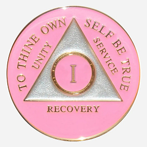 This Triplate AA Token features a unique pink cloud design with the AA symbol and motto subtly embedded, representing the hope and serenity of early recovery.