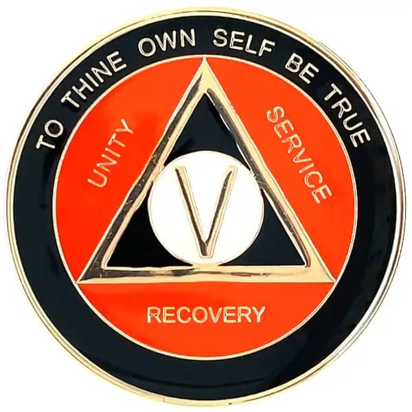 A red and black coin with the words " unity, service, recovery ", and " to thine own self be true ".