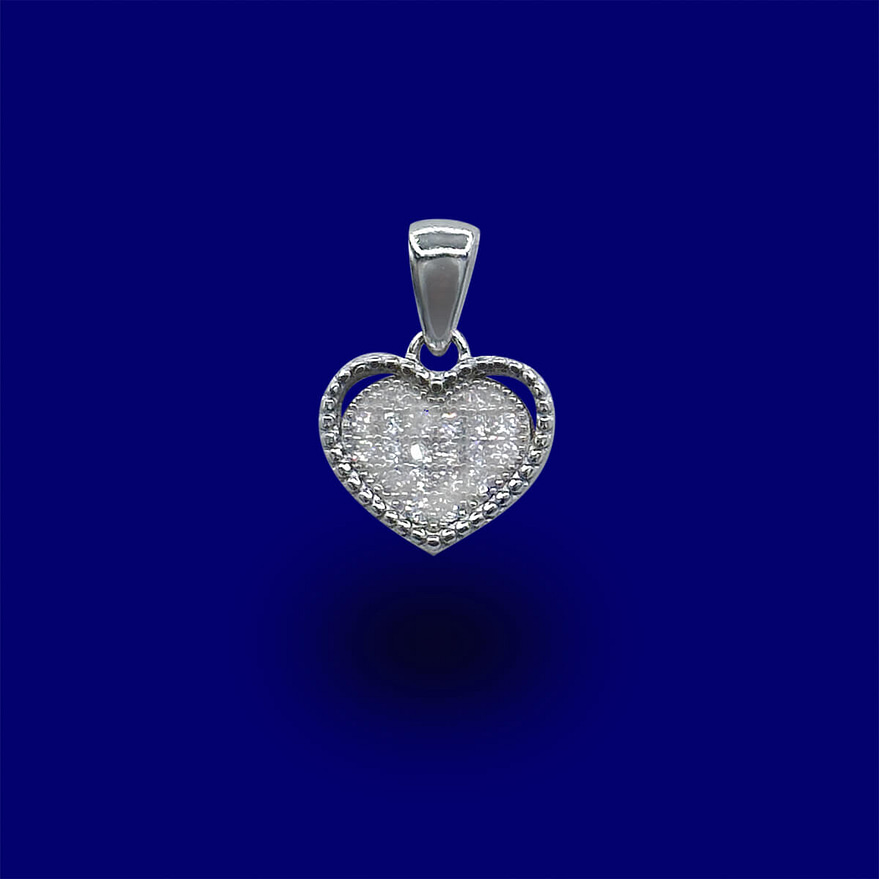 A heart shaped diamond pendant with blue background