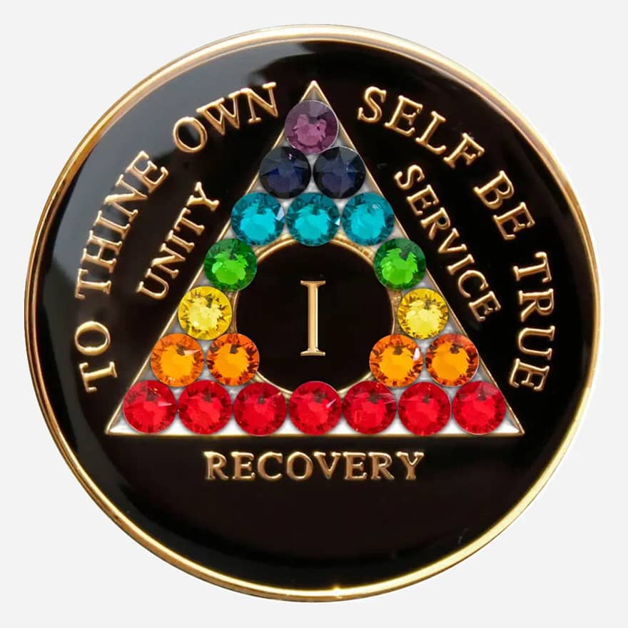 A vibrant spectrum of Swarovski crystals representing the chakra colors is displayed on this Crystal AA Medallion, symbolizing the balance and healing achieved through recovery.