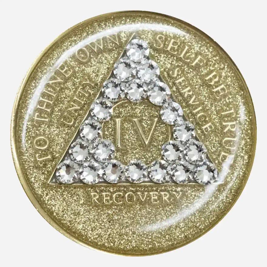 A gold crystal AA medallion with glitter and diamond crystals, featuring the AA symbol and sobriety year options.