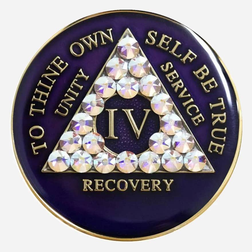 This Crystal AA Medallion features a rich purple hue with brilliant Swarovski diamond crystals, representing the inner peace and wisdom cultivated through recovery.