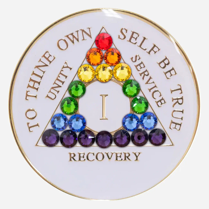 This Crystal AA Medallion celebrates diversity and inclusivity in recovery. The vibrant LGBTQ rainbow flag, crafted with Swarovski crystals, stands out against the pristine white background.