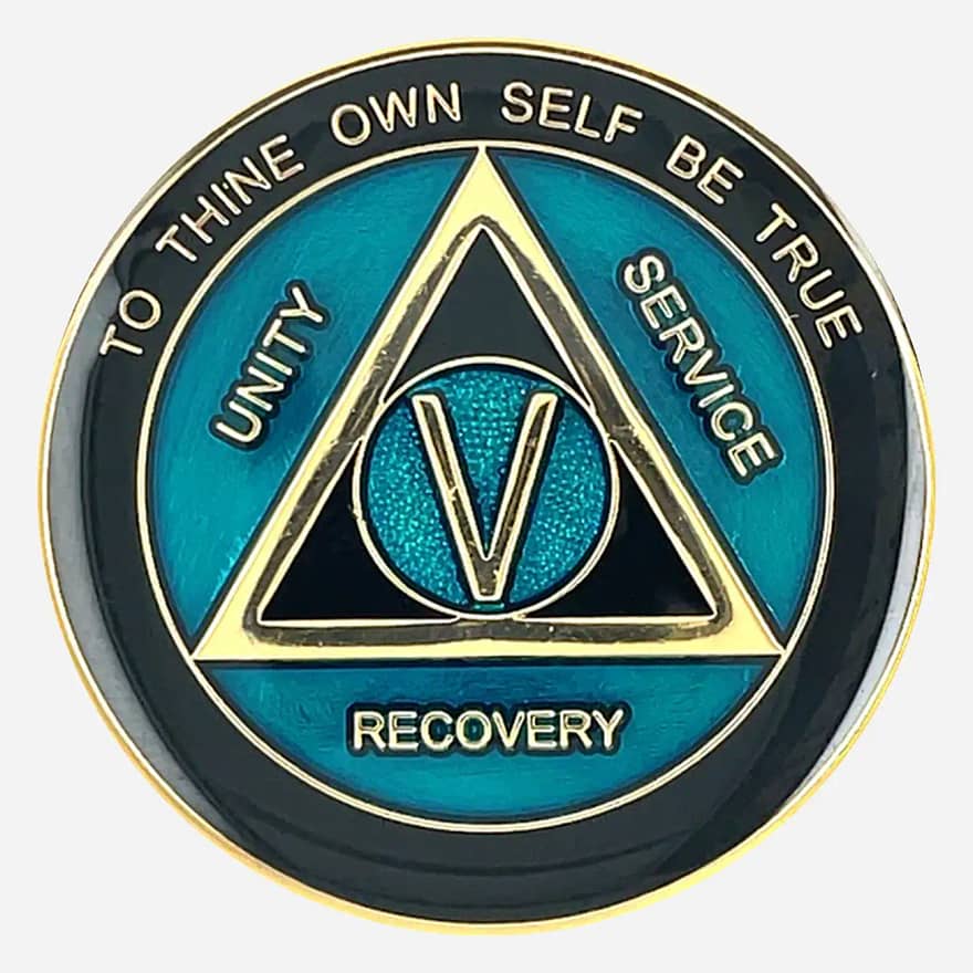 Alcoholics Anonymous medallion (34mm) with a sleek black enamel background and vibrant teal detailing. Features a gold-plated AA circle and triangle symbol, encircled by 'Unity,' 'Service,' 'Recovery' in gold lettering. The outer edge reads 'To Thine Own Self Be True' at the top and the sobriety year (1-50) at the bottom, all in gold. The coin has a glossy, epoxy-coated finish for durability and striking colors.