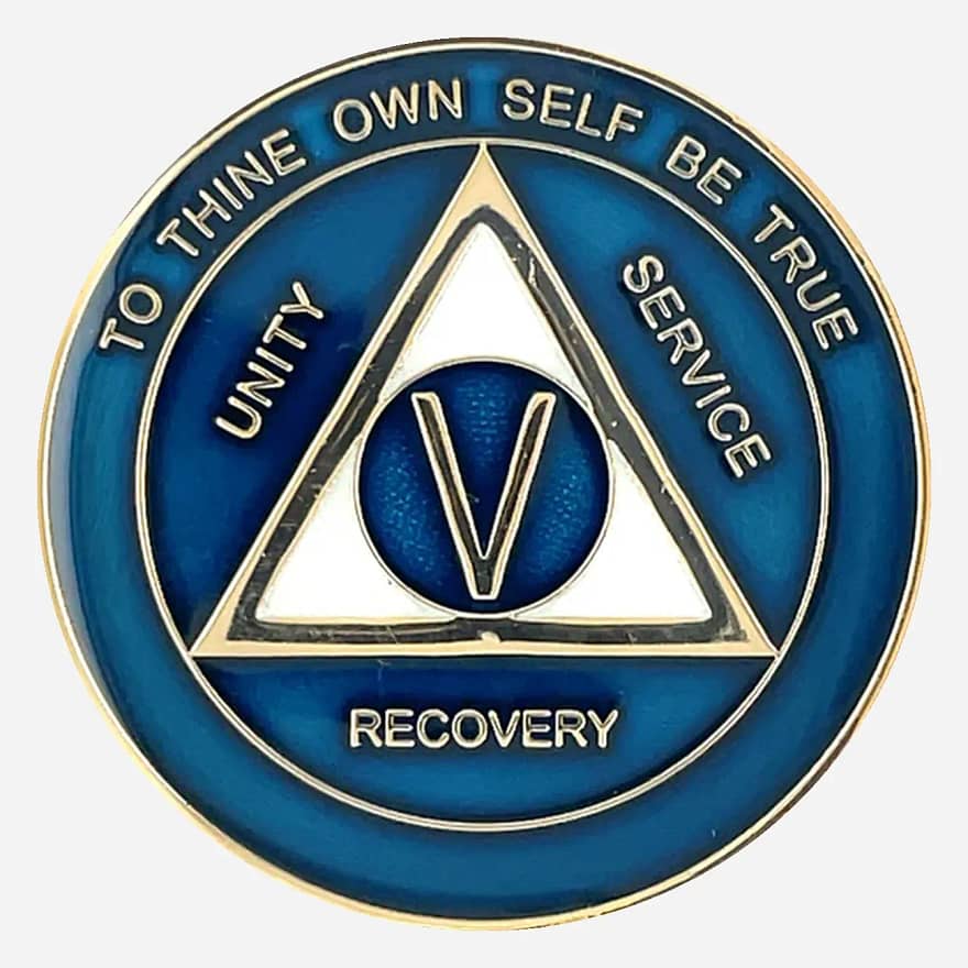 Alcoholics Anonymous medallion (34mm) with a vibrant blue enamel border and a shimmering pearlized center. Features a gold-plated AA circle and triangle symbol, encircled by 'Unity,' 'Service,' 'Recovery' in gold lettering. The outer edge reads 'To Thine Own Self Be True' and the sobriety year (1-50), all in gold. The coin has a glossy, epoxy-coated finish that enhances its rich colors and provides durability.