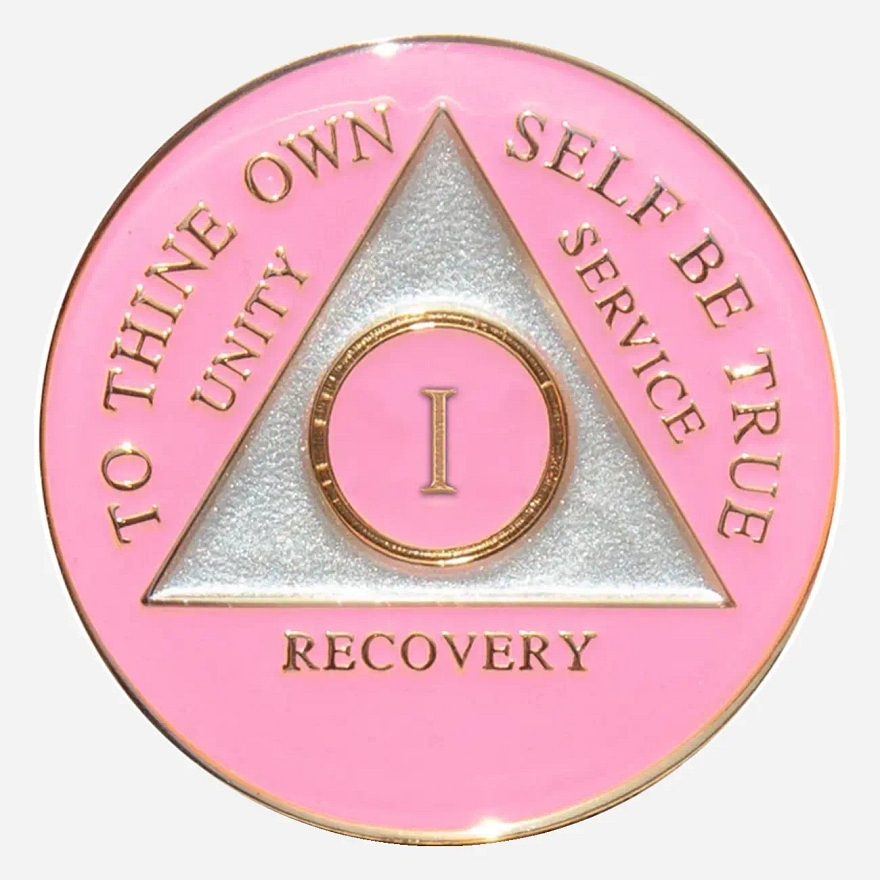 This Triplate AA Token features a unique pink cloud design with the AA symbol and motto subtly embedded, representing the hope and serenity of early recovery.