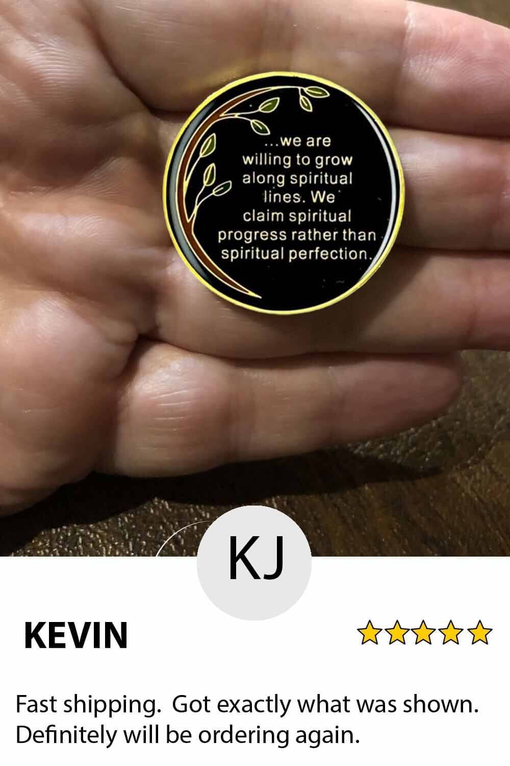 A person holding up a coin with the words " kevin " on it.